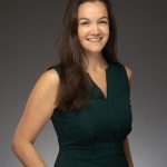 Mercedes De Guardiola of the New York Junior League smiles at the camera in a professional headshot.